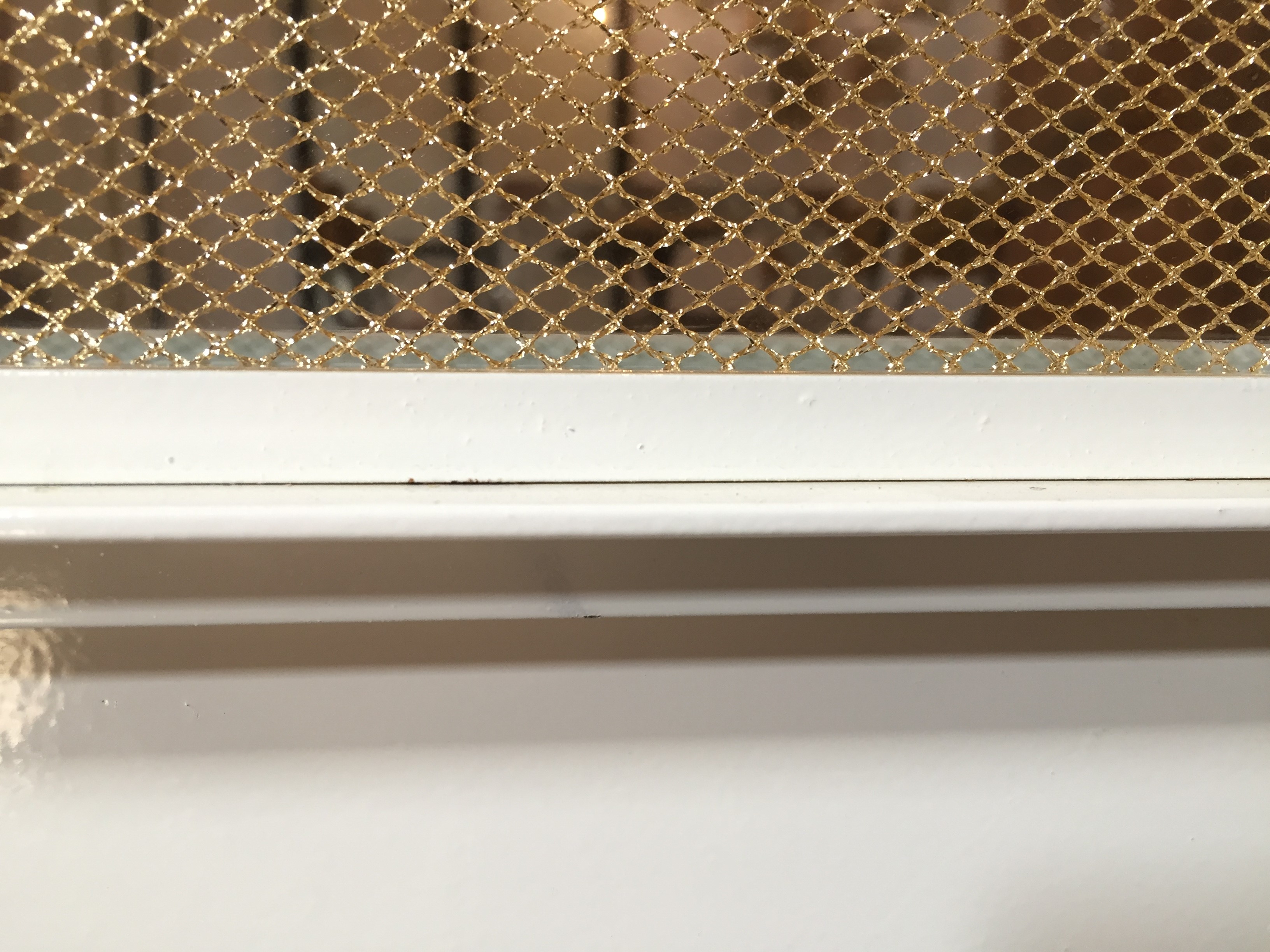 Witte stalen deuren met Gatsby glas, met goud geweven